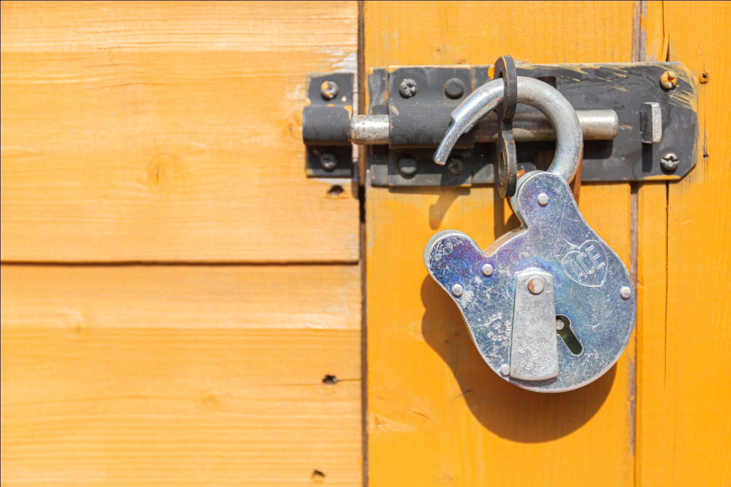 Traditional wooden door padlock can also be replaced with our home locksmith services in Bonita.