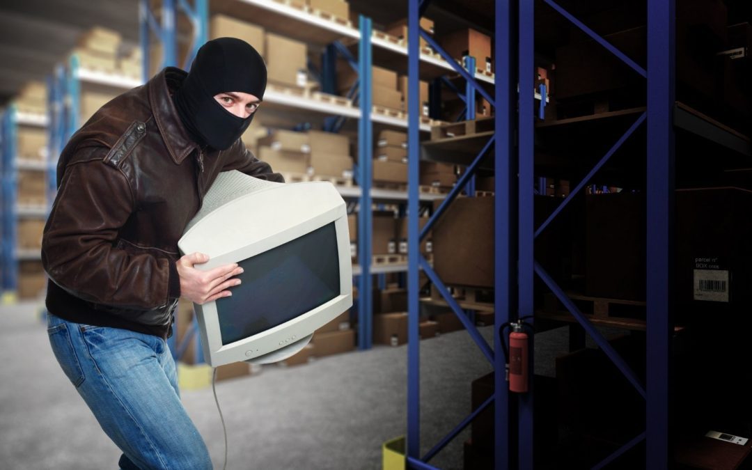 A burglar steals a computer from a warehouse, emphasizing the important of learning how to prevent commercial theft